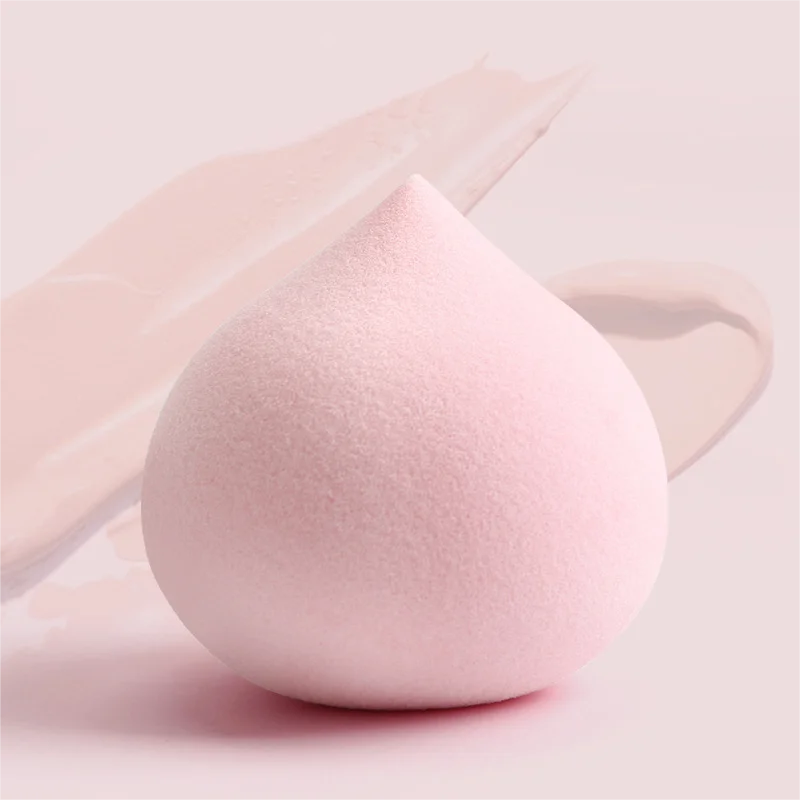 Merit Sell soft pink wet and dry makeup blender set sponge with creamy foundation background