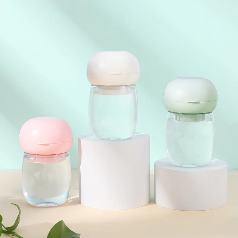 Merit Sell food grade pet water dispenser in pastel pink white and green with clear water bottles