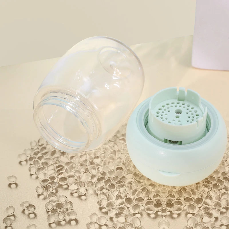 Merit Sell food grade pet water dispenser with transparent container and light blue base on beige surface