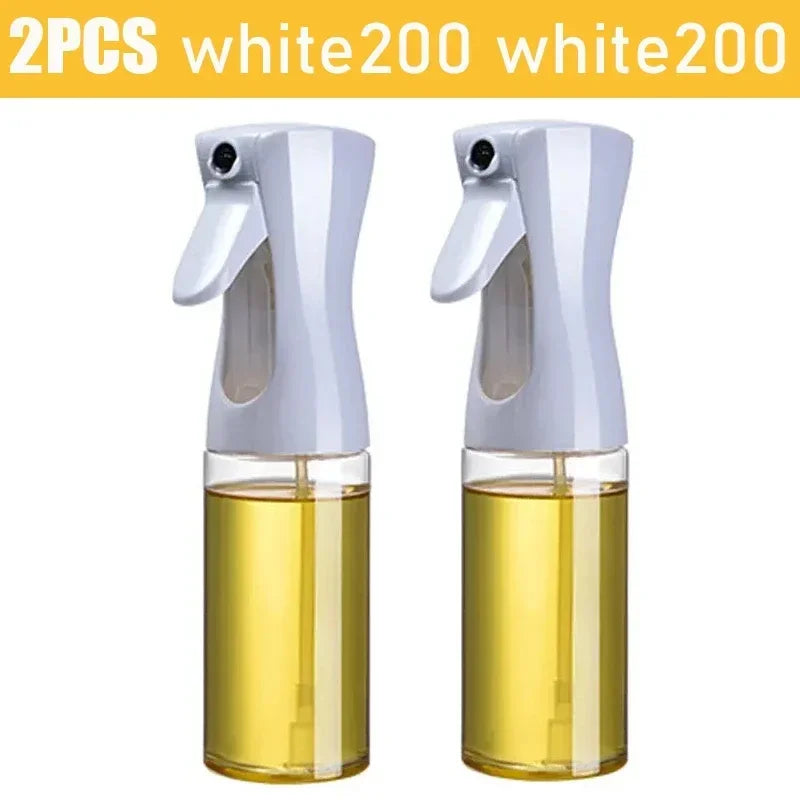 Set of 2 white kitchen oil dispenser sprayers with transparent containers for easy oil spraying