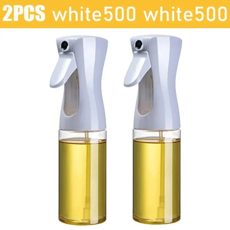 Set of two Merit Sell kitchen oil dispenser sprayer bottles with white spray tops and clear containers