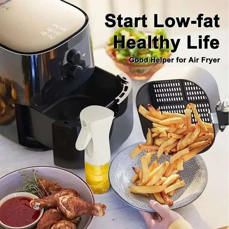 Merit Sell kitchen oil dispenser sprayer with white top used to spray oil for air fryer cooking fries and chicken