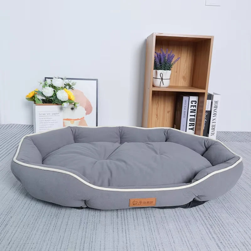 Gray warm pet sofa for big dogs with plush cushioning and raised edges for comfort