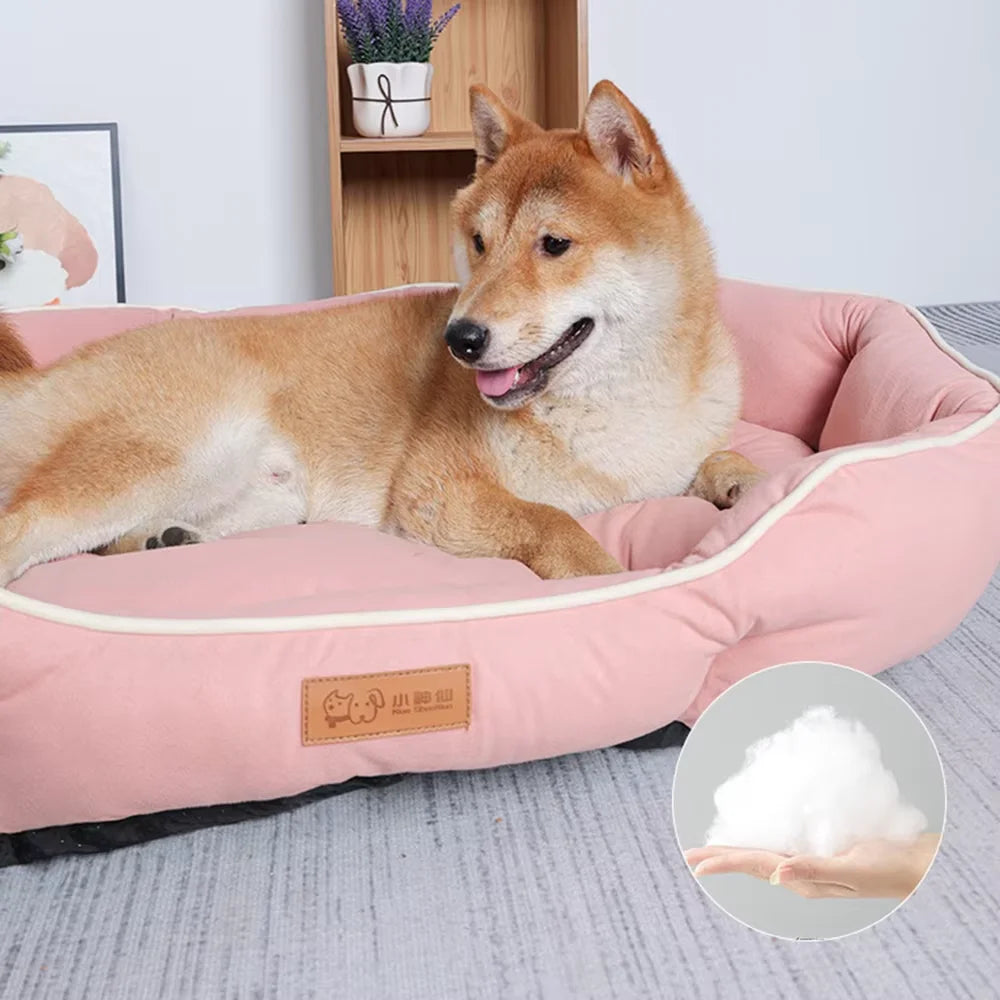 Shiba Inu resting comfortably on a warm pet sofa for big dogs in soft pink color