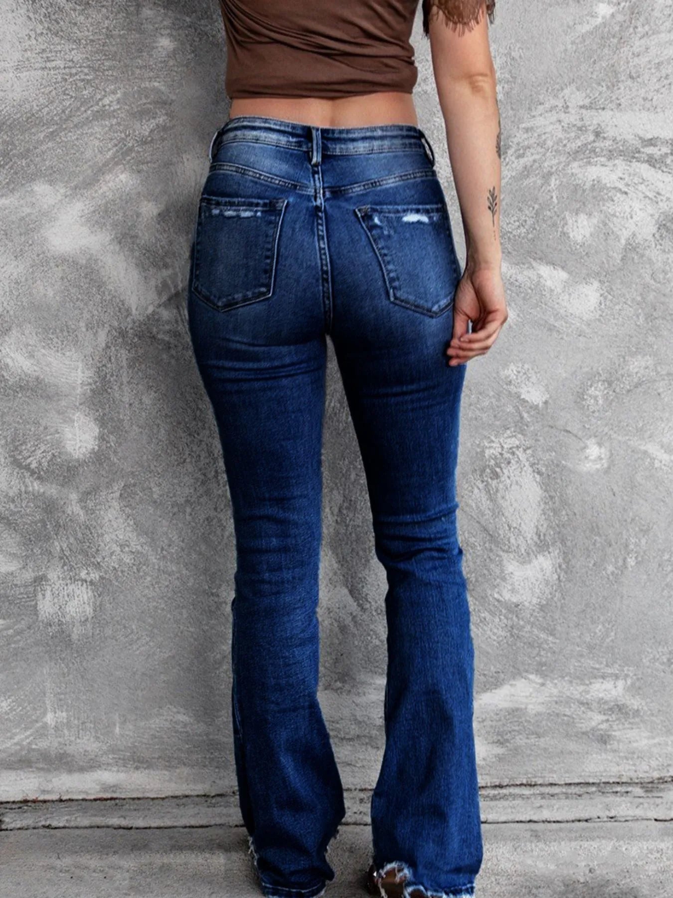 Distressed Flare Jeans - Merit Sell