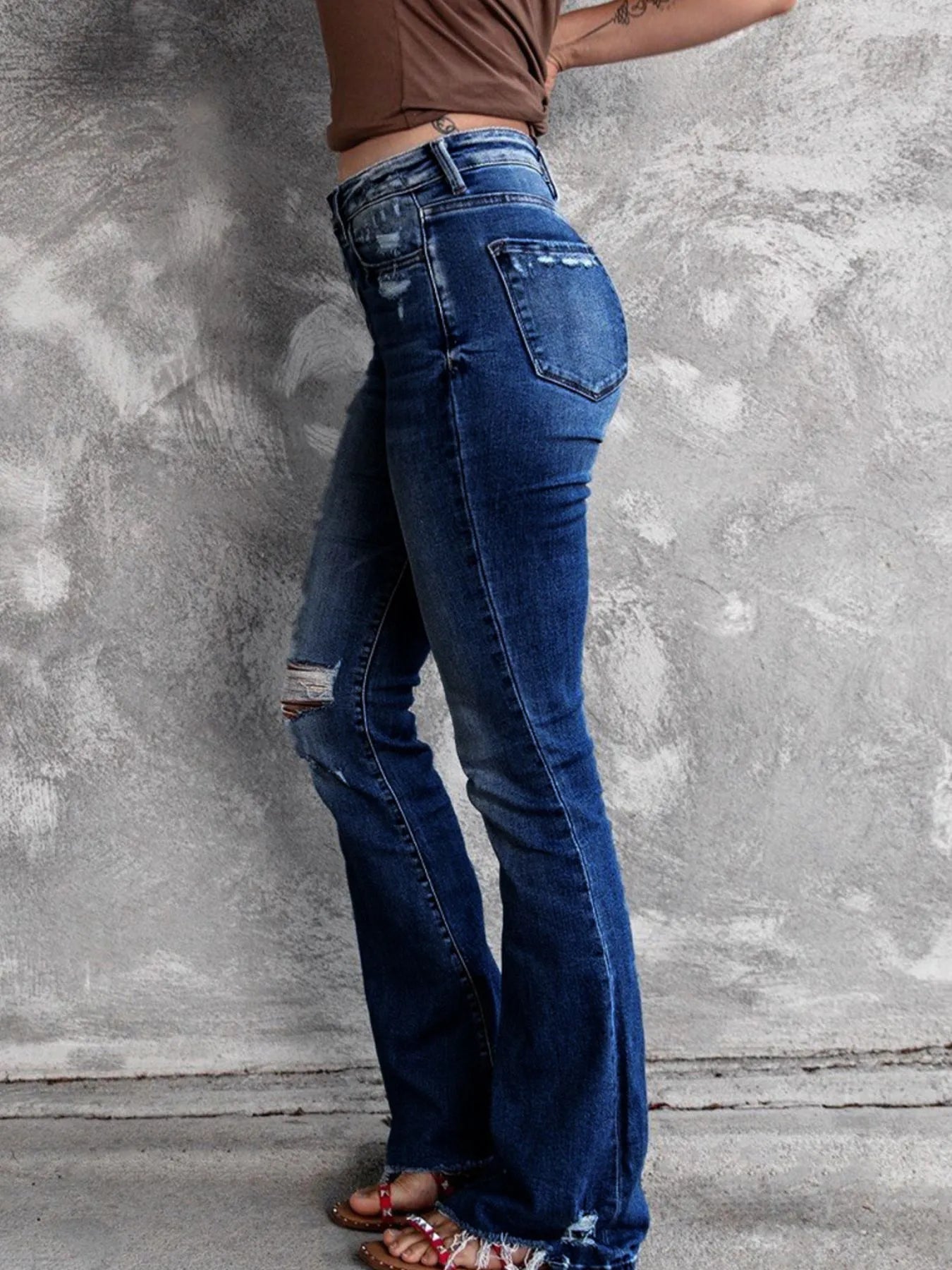 Distressed Flare Jeans - Merit Sell