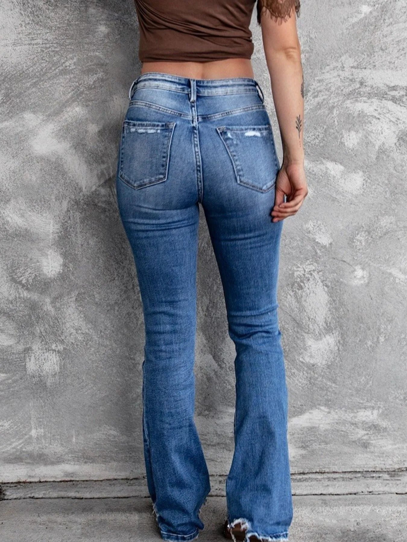 Distressed Flare Jeans - Merit Sell