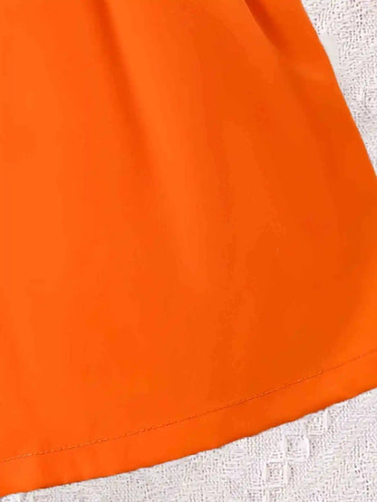 Girls' bright orange shorts: stylish double-breasted design, summer vibrant style - Merit Sell