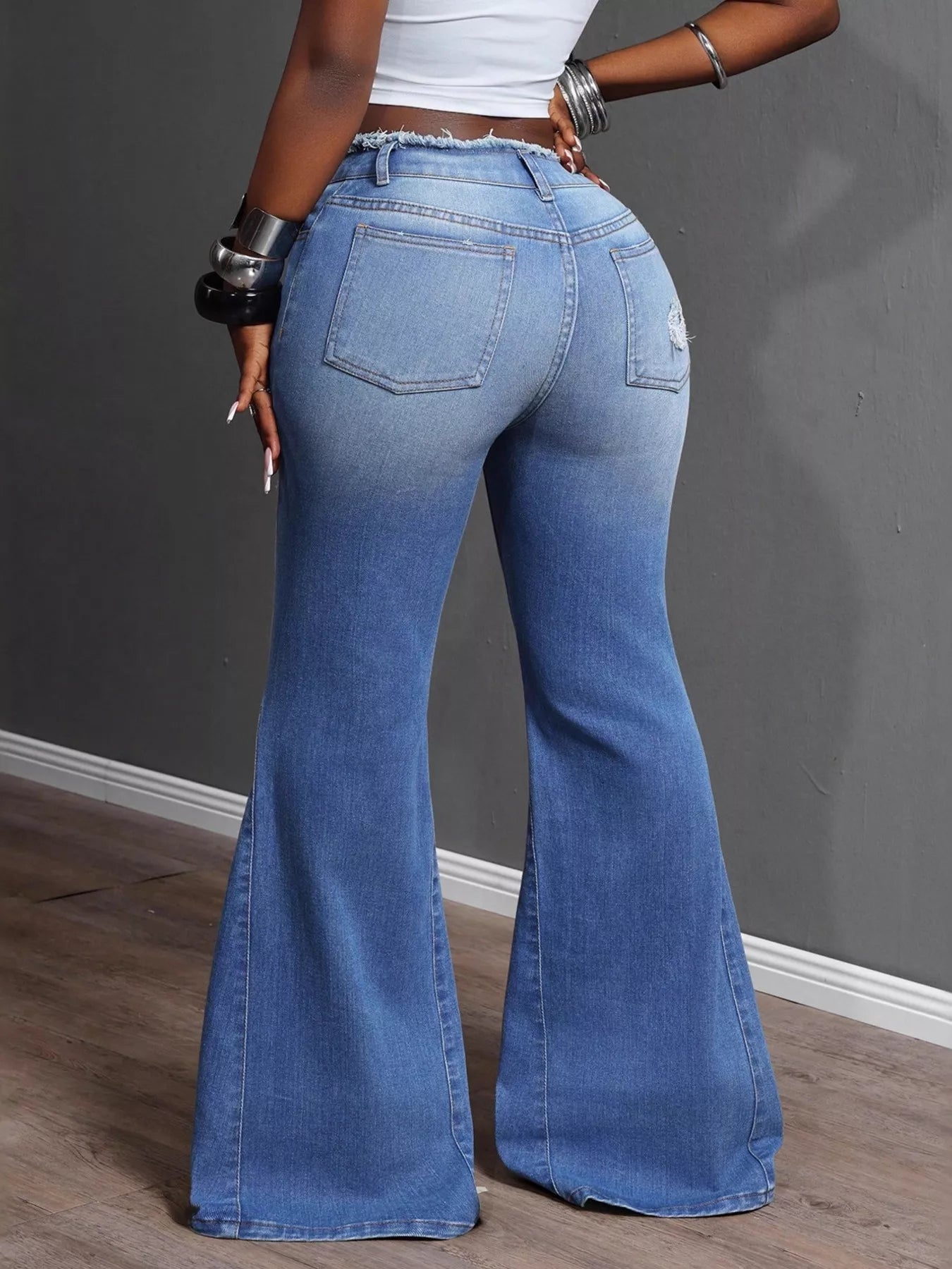 High Waisted Distressed Flare Jeans - Merit Sell