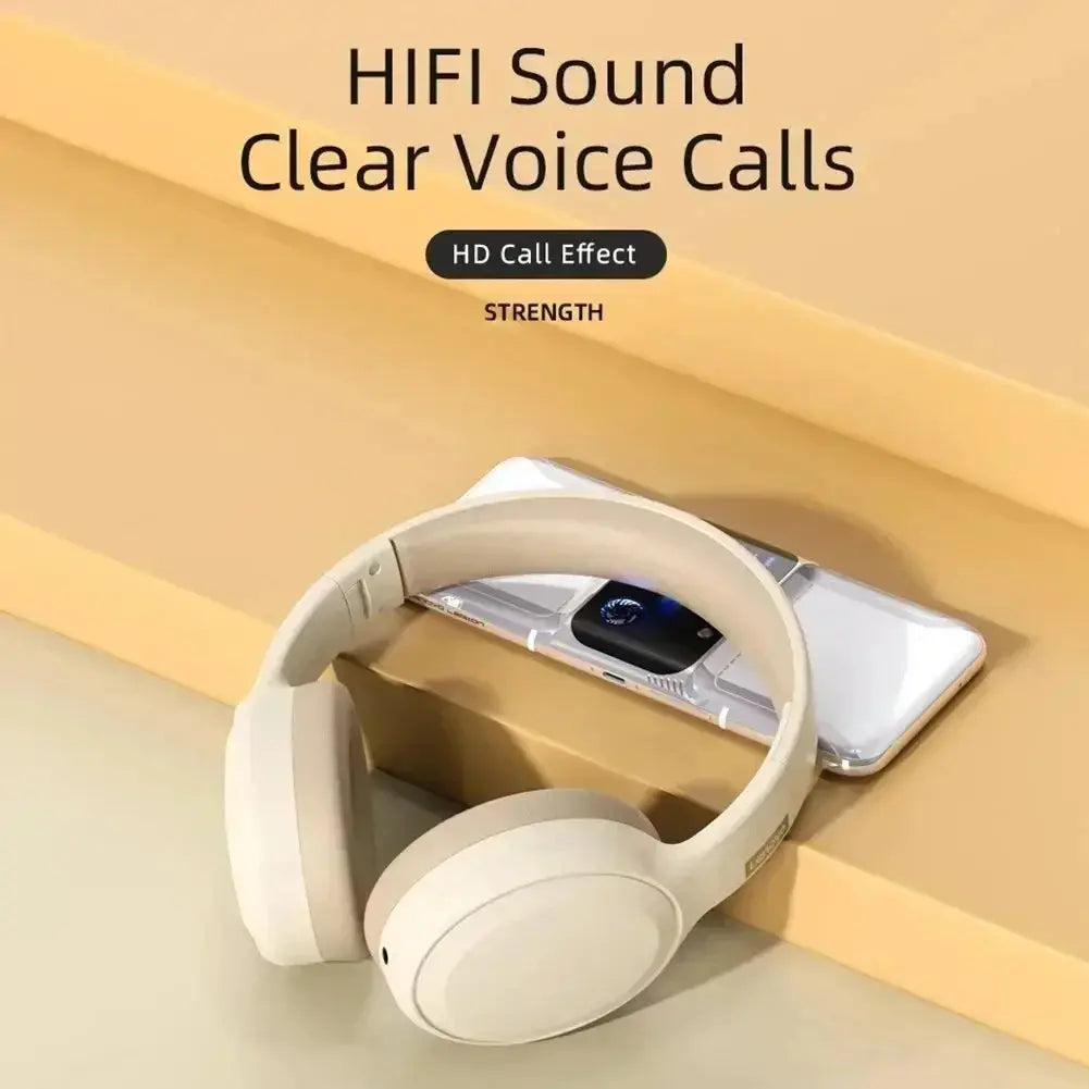 Beige over-ear wireless headphones resting on a smartphone, with promotional text reading 'HIFI Sound Clear Voice Calls' and 'HD Call Effect' above.