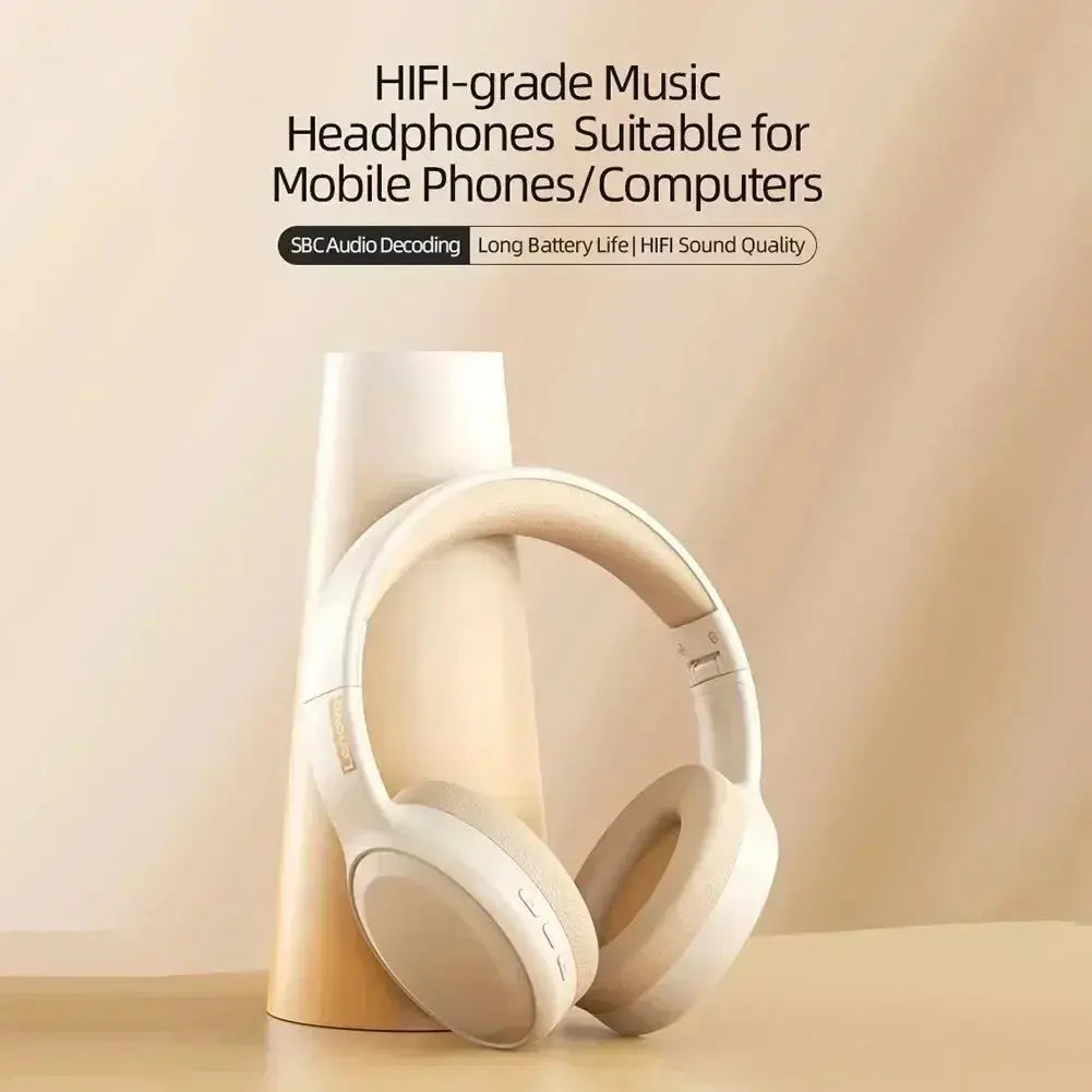 White headphones on a beige stand with text about HIFI-grade music quality.