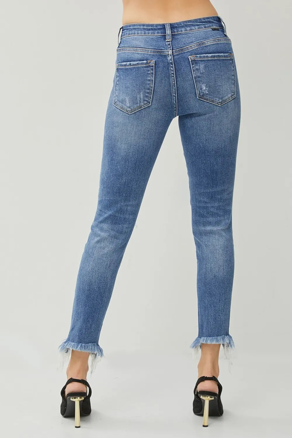 RISEN Distressed Frayed Hem Slim Jeans - Merit Sell