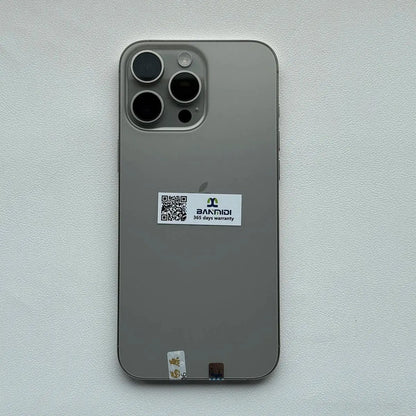 Apple iPhone 16 Pro Max 256GB unlocked in silver showing the back with triple camera setup and warranty sticker