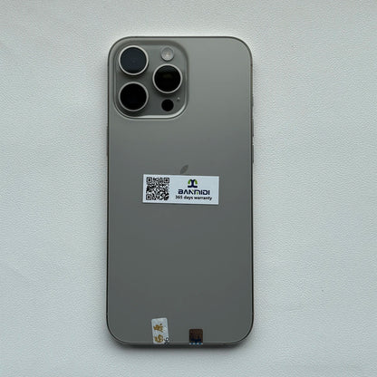Apple iPhone 16 Pro Max 256GB unlocked in silver showing the back with triple camera lenses and warranty sticker