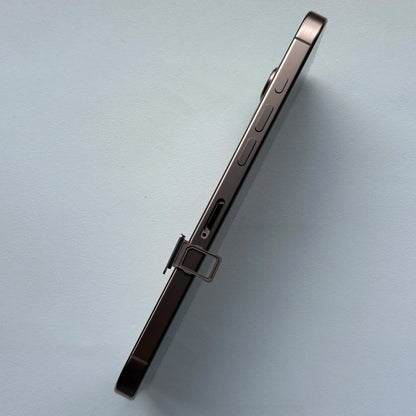 Side view of iPhone 16 Pro Max showing SIM card tray with ejector pin to buy iPhone 16 Pro Max 256GB online