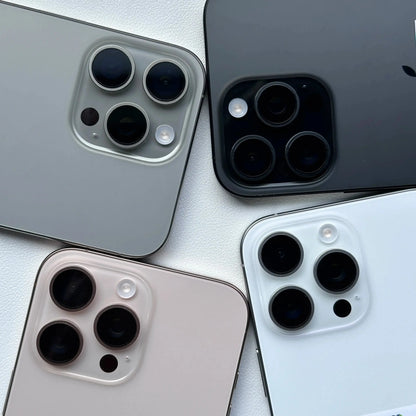 Unlocked iPhone 16 Pro Max for sale showing four color options with triple camera lenses