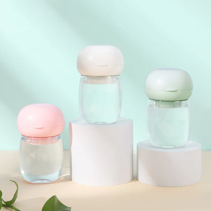 Merit Sell food grade pet water dispenser in pastel pink white and green with clear water bottles