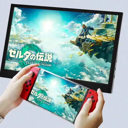 black computer monitor gaming front view displaying vibrant game screen with handheld red controller Merit Sell