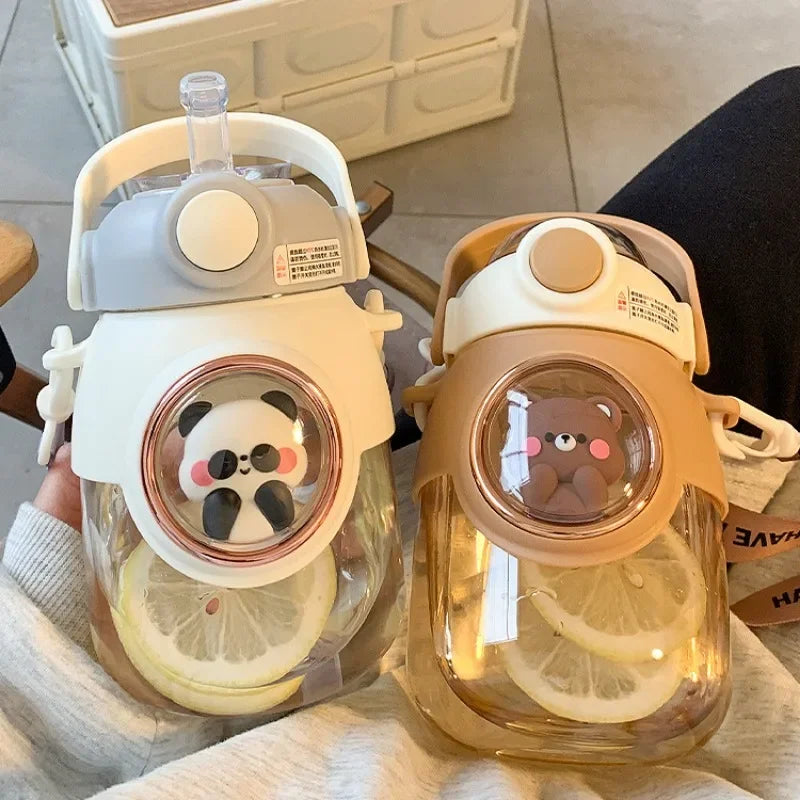 Merit Sell kids water bottle with straw featuring panda and bear designs with lemon slices inside