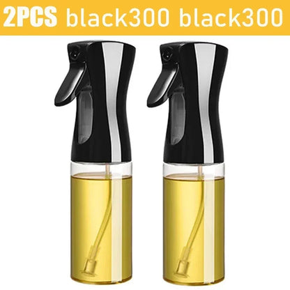 Set of 2 black kitchen oil dispenser sprayer bottles with transparent containers filled with oil