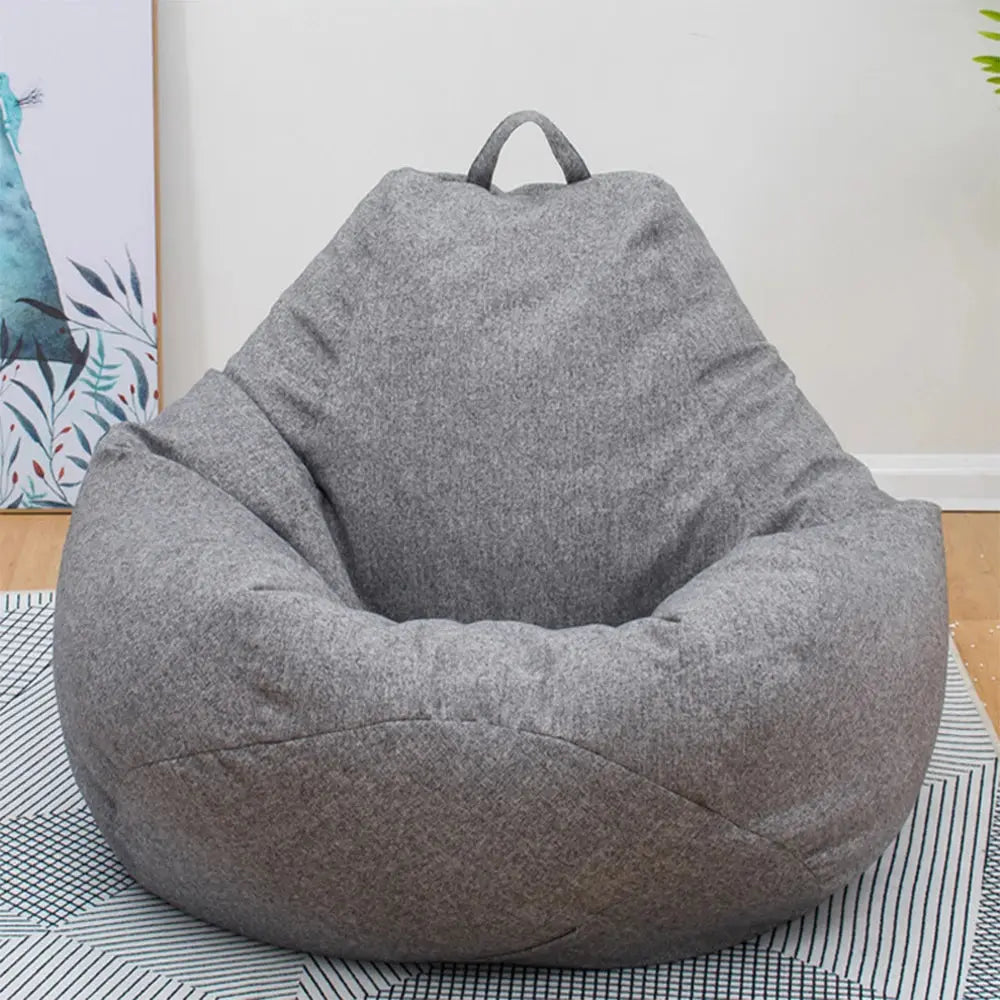 Gray lazy sofa cover for living room shaped like a large soft bean bag chair with a handle