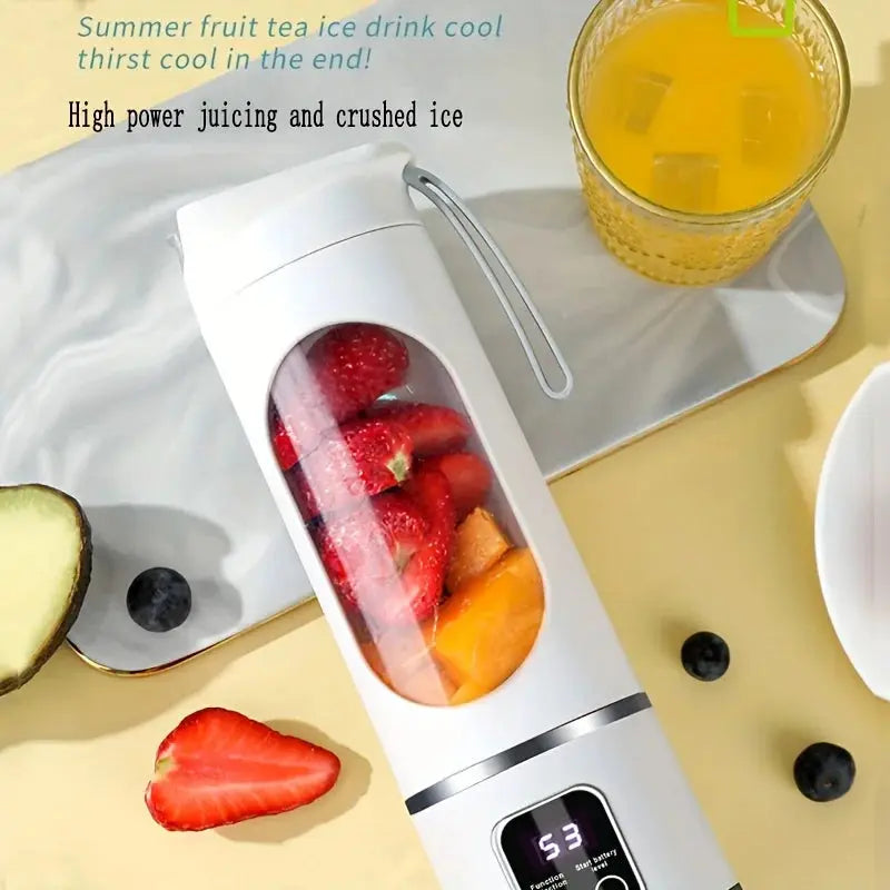 Merit Sell ninja blast portable blender with fresh fruit inside and digital display on white background